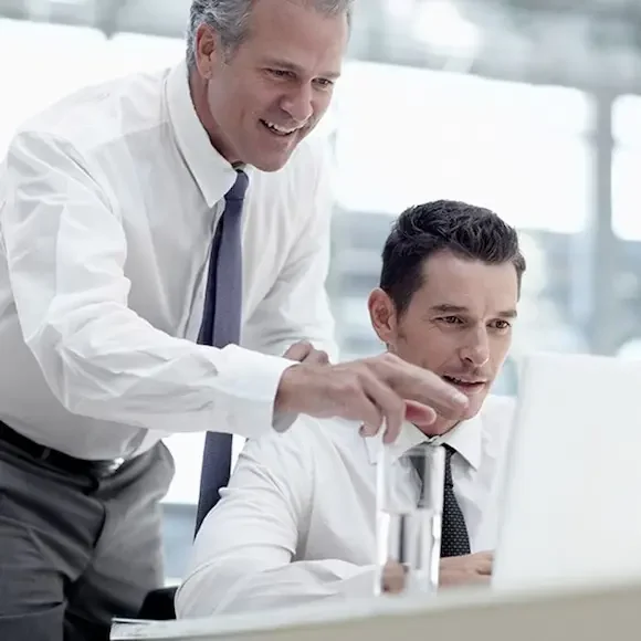 Certified Public Accountant Near Me looking at computer